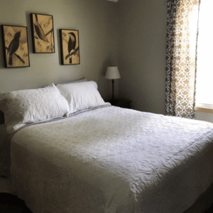 Queen Bed in Guest House at Graceful Gatherings Wedding Venue