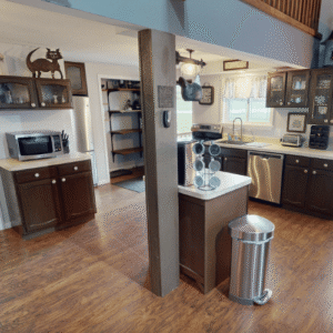 Kitchen view with center island microwave coffee machine