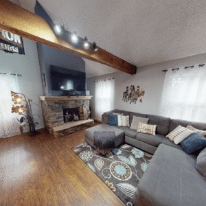 Living room with sectional couch and tv
