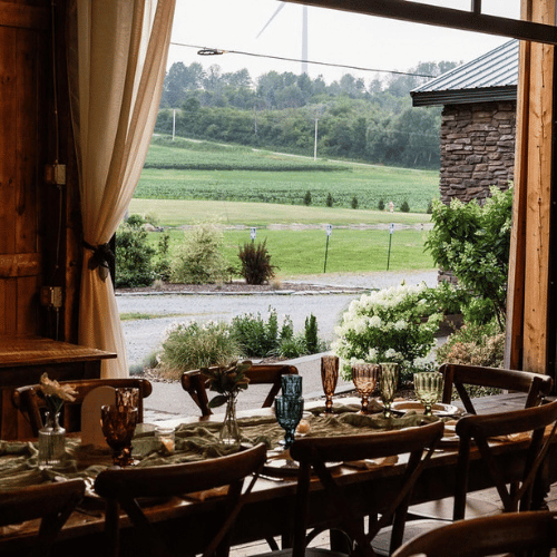 Renovated Barn Wedding Venue with Open Air Garage Doors